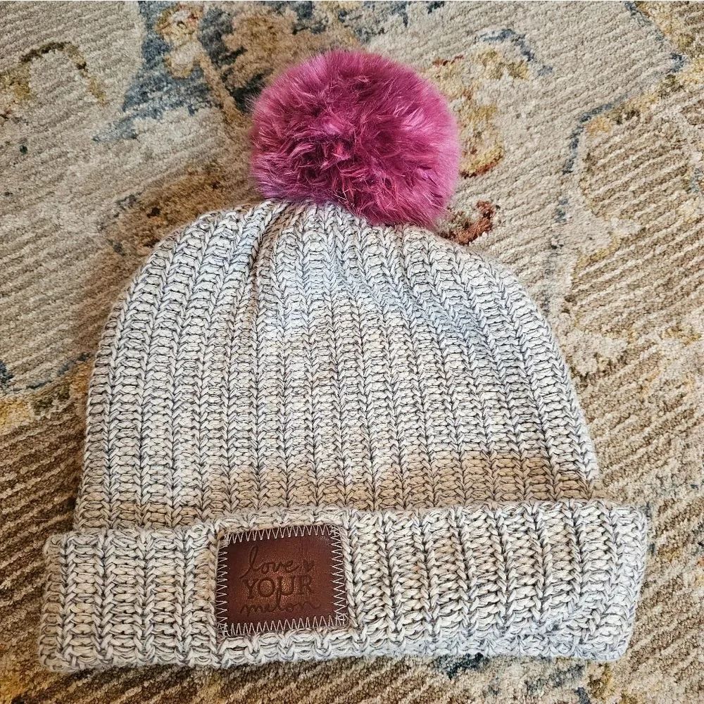 Love your melon beanie. Gray and off white with pink removable pompom and